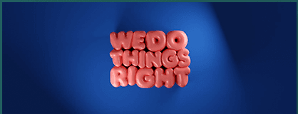 3D lettering reading We Do Things Right on a blue backdrop